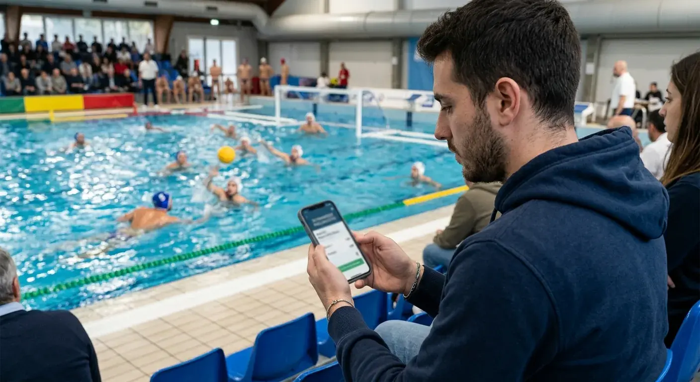 Persona che scommette sulla pallanuoto dallo schermo dello smartphone